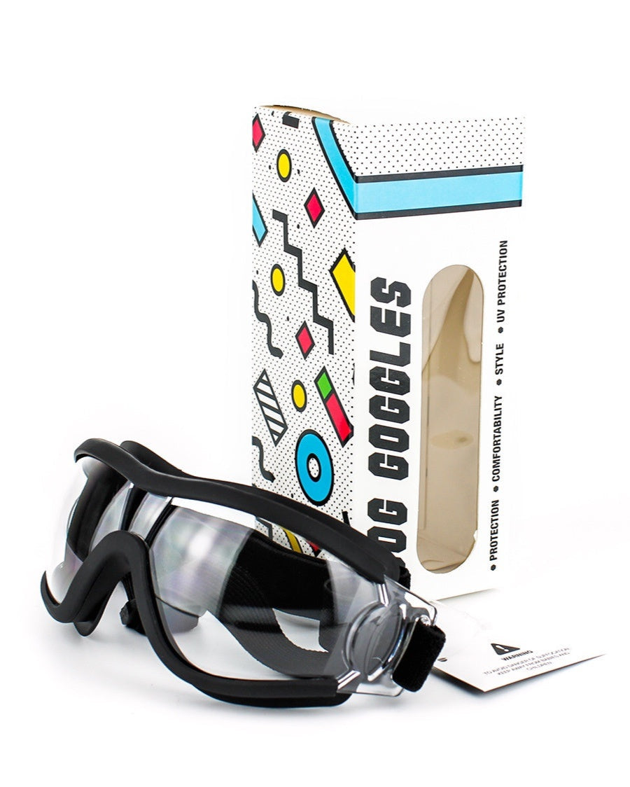 Windproof motorcycle goggles with clear lenses and adjustable strap, packaged in colorful box.